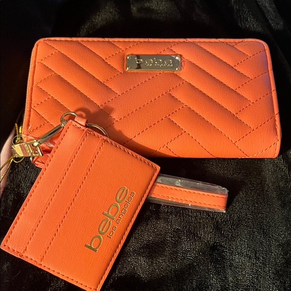 bebe Handbags - bebe Orange Quilted Wallet with Card Holder and Wristlet